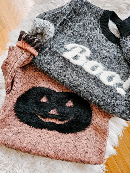 Pumpkin fuzzy skull sweater