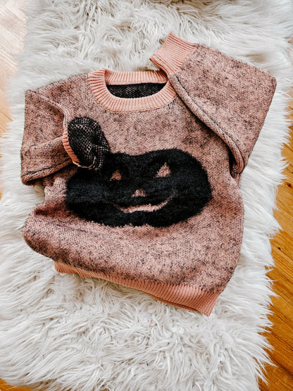 Pumpkin fuzzy skull sweater