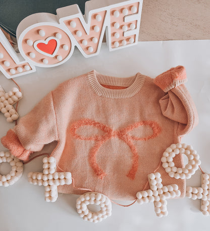 Fuzzy bow sweater